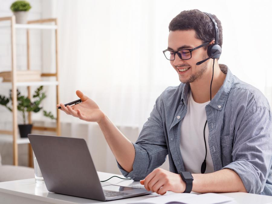 A student on a call, working from home.